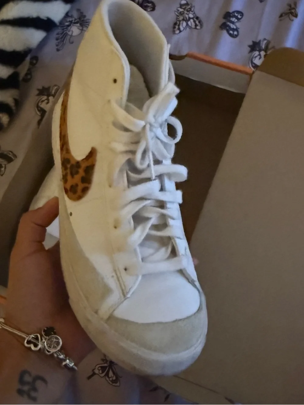 Nike White High-Top Sneakers with Leopard-Print Swoosh